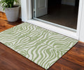 3' X 5' Artichoke Green And Ivory Animal Print Washable Indoor Outdoor Area Rug