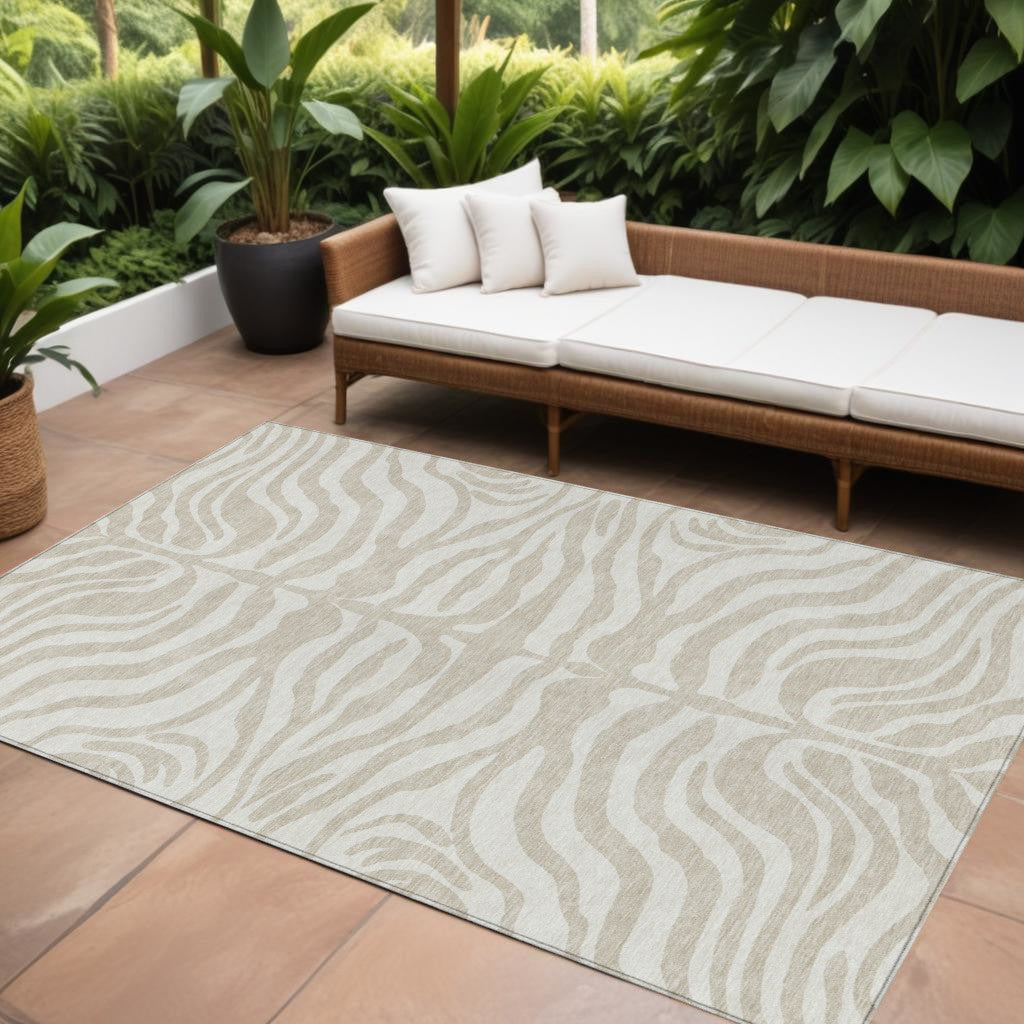9' X 12' Beige And Tan Animal Print Washable Indoor Outdoor Area Rug
