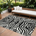 8' X 10' Black And Ivory Animal Print Washable Indoor Outdoor Area Rug