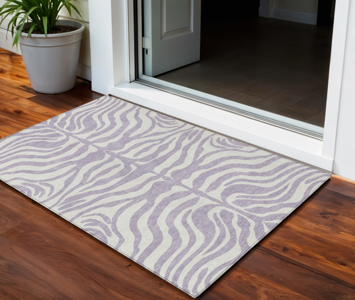 3' X 5' Lavender And Ivory Animal Print Washable Indoor Outdoor Area Rug