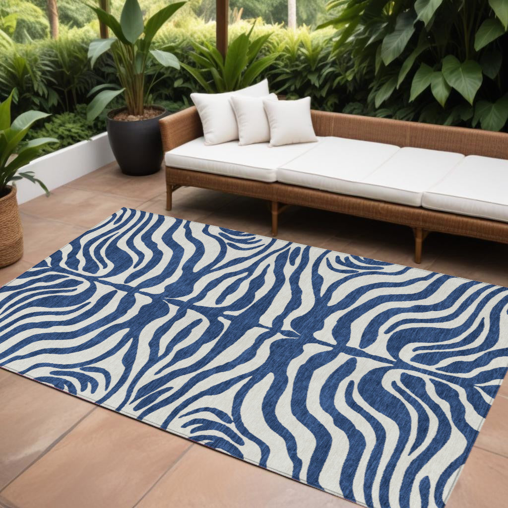 10' X 14' Navy Blue And Ivory Animal Print Washable Indoor Outdoor Area Rug
