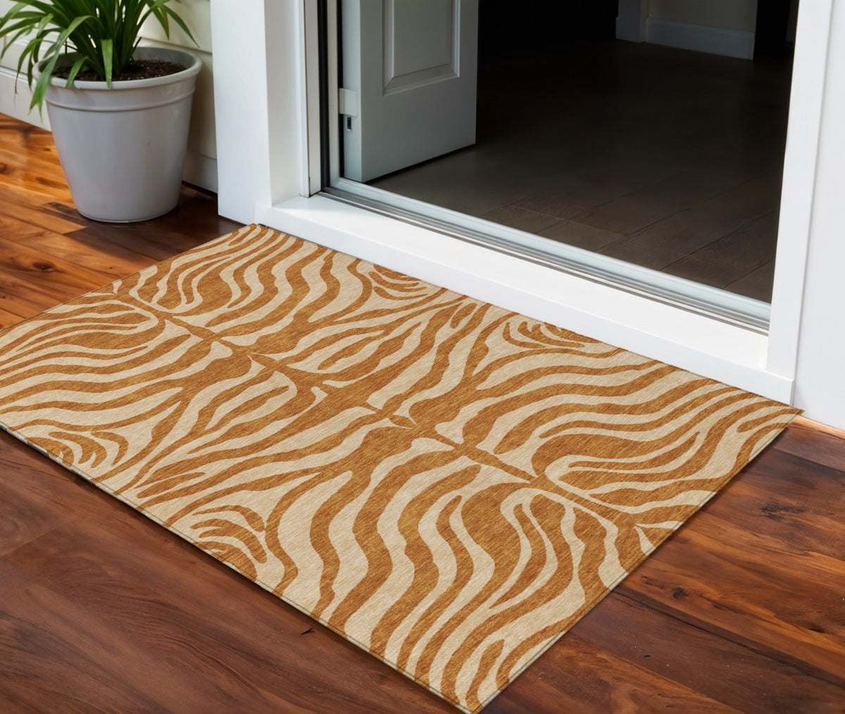 3' X 5' Copper And Tan Animal Print Washable Indoor Outdoor Area Rug