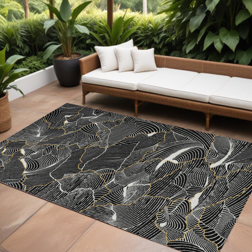 9' X 12' Black Ivory And Gold Abstract Washable Indoor Outdoor Area Rug