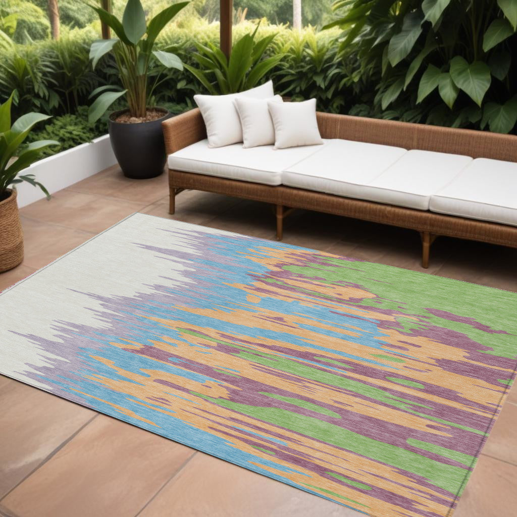 9' X 12' Peach Purple And Green Abstract Washable Indoor Outdoor Area Rug