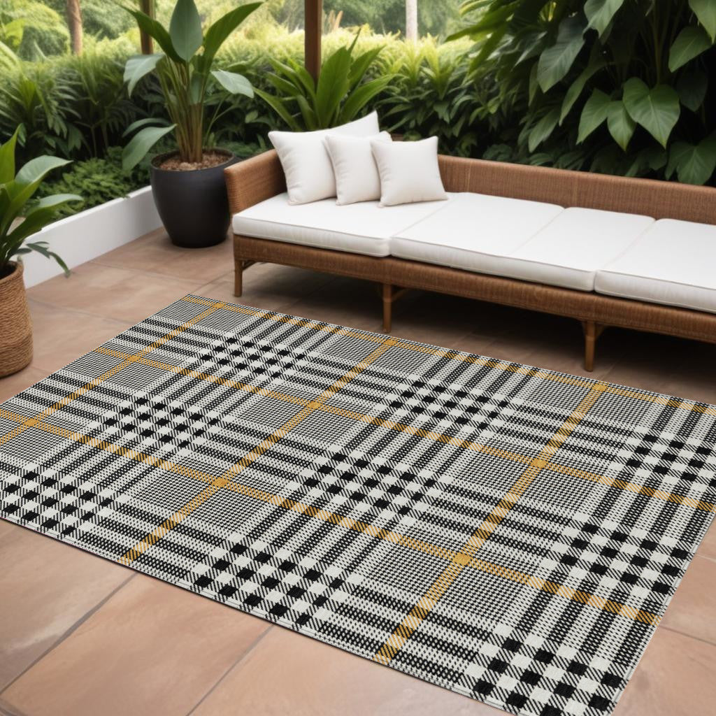 10' X 14' Black Gold And Ivory Plaid Washable Indoor Outdoor Area Rug