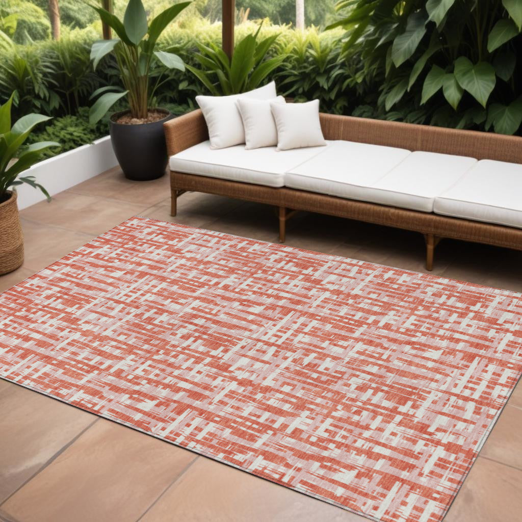 9' X 12' Coral Pink And Ivory Abstract Washable Indoor Outdoor Area Rug