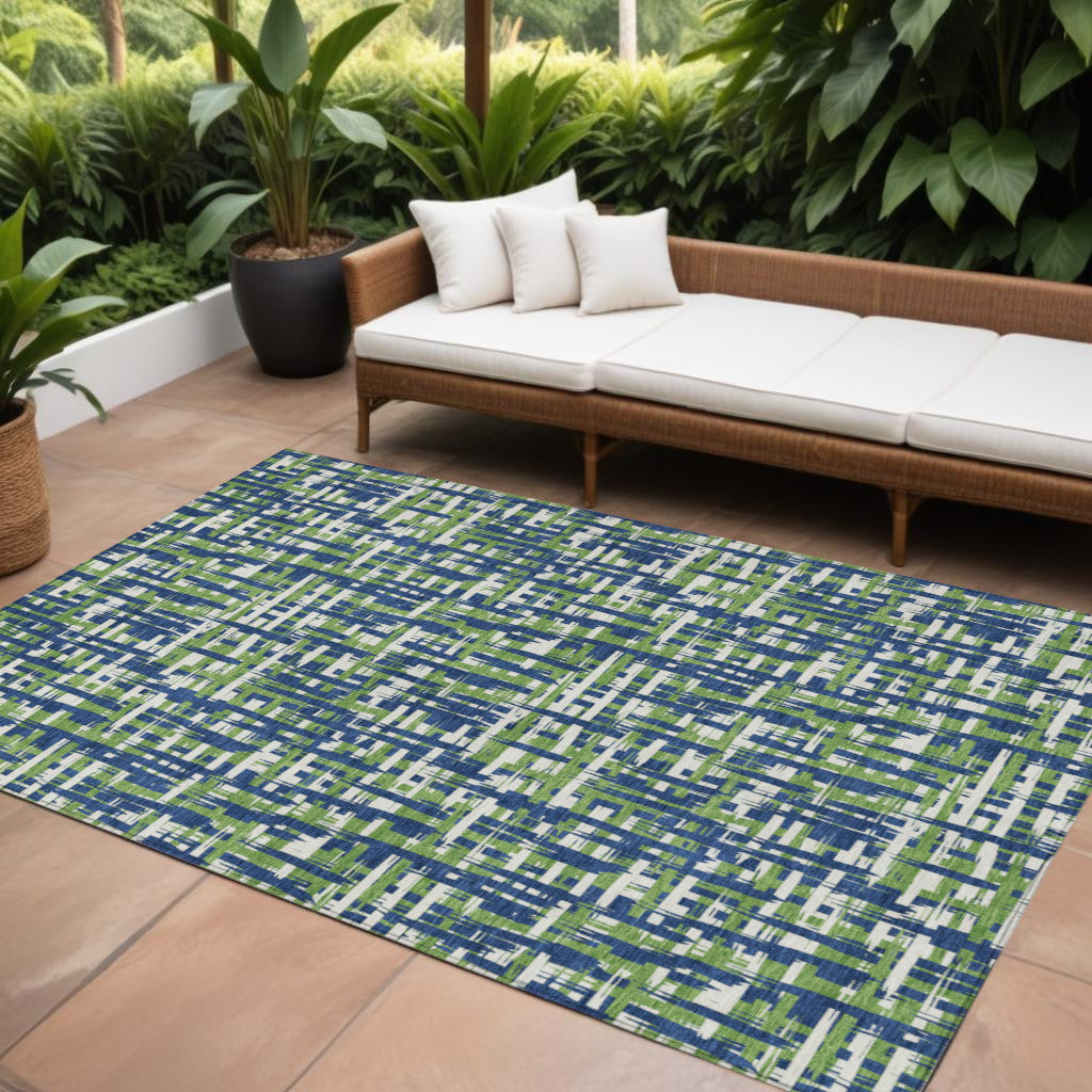 9' X 12' Navy Blue Green And Ivory Abstract Washable Indoor Outdoor Area Rug