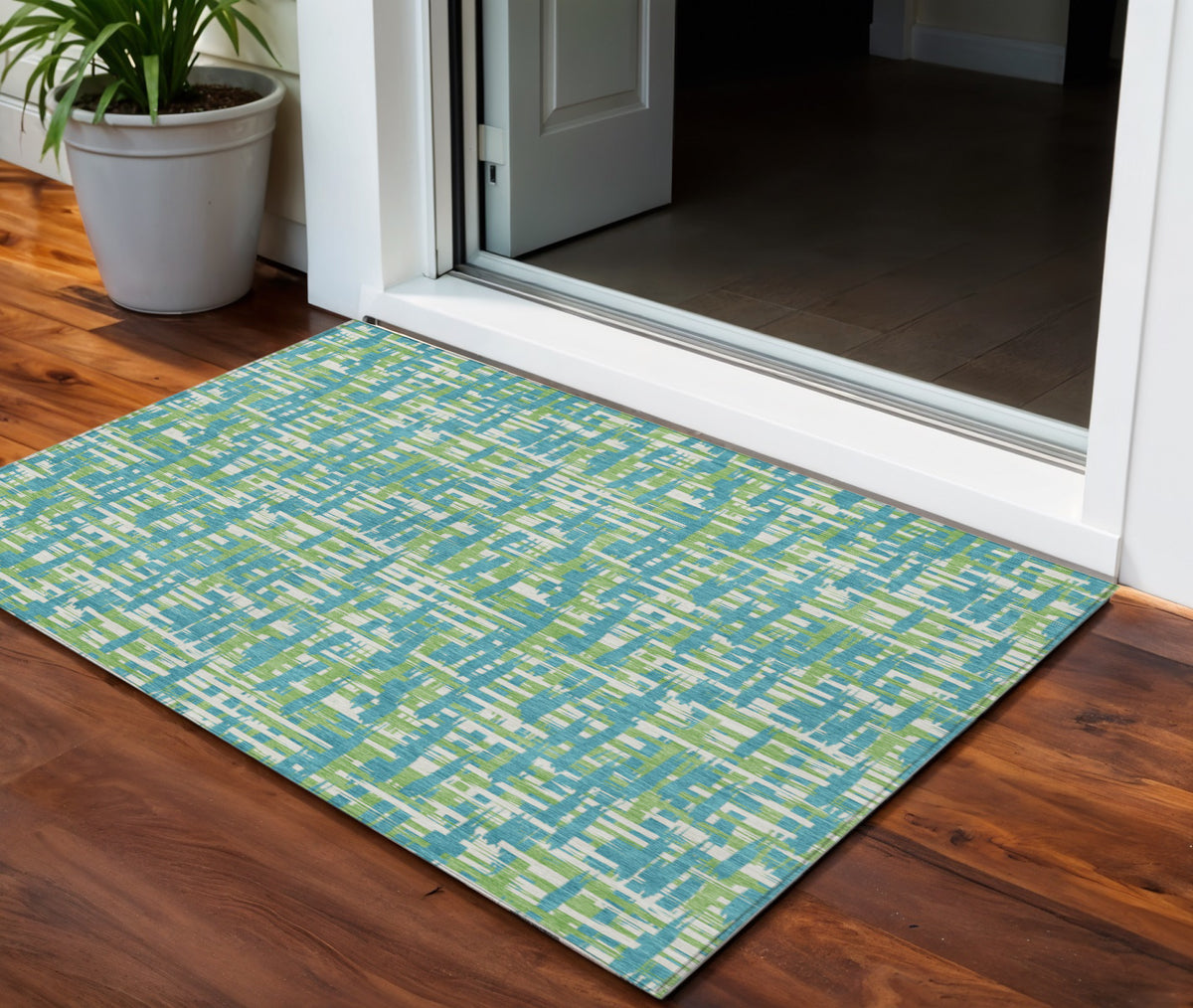 3' X 5' Turquoise Green And Ivory Abstract Washable Indoor Outdoor Area Rug