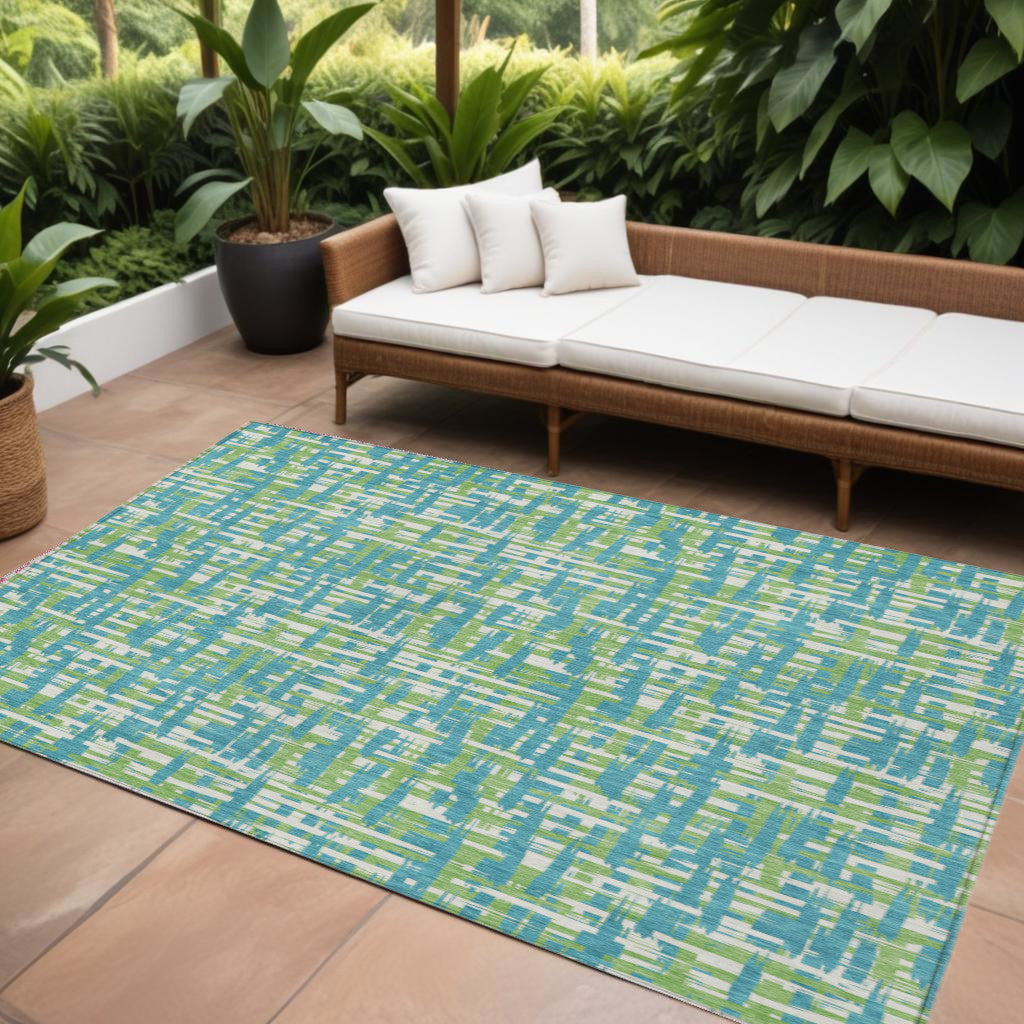 10' X 14' Turquoise Green And Ivory Abstract Washable Indoor Outdoor Area Rug