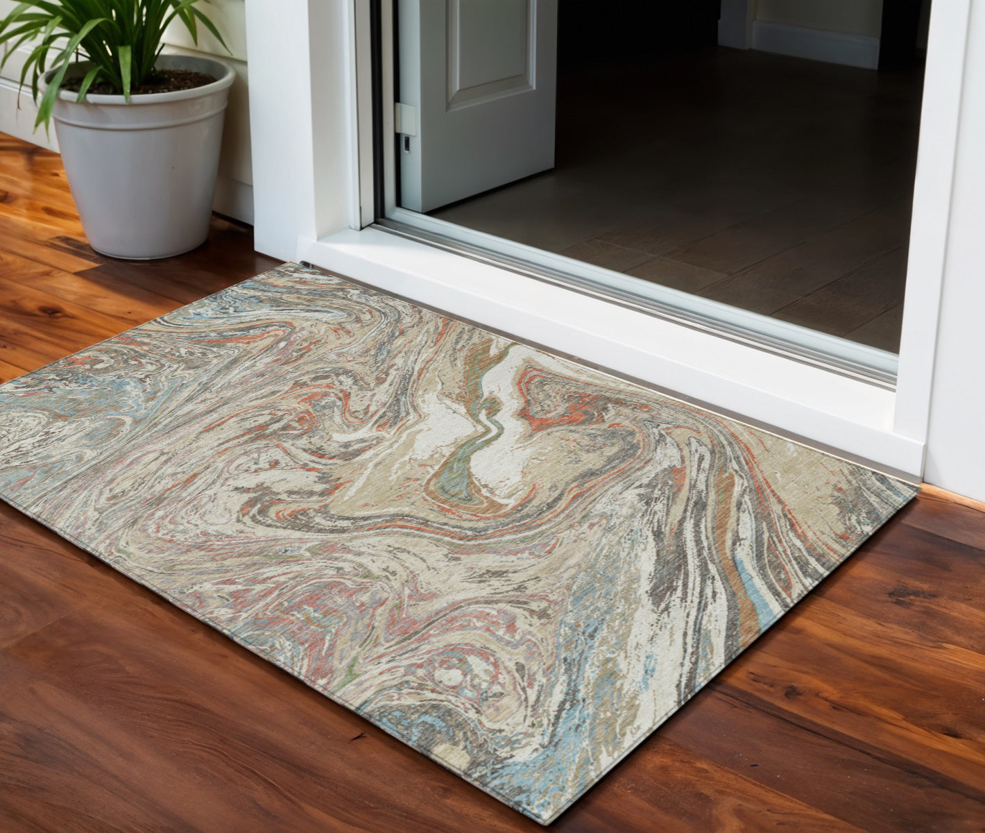 3' X 5' Beige Pink And Blue Abstract Washable Indoor Outdoor Area Rug