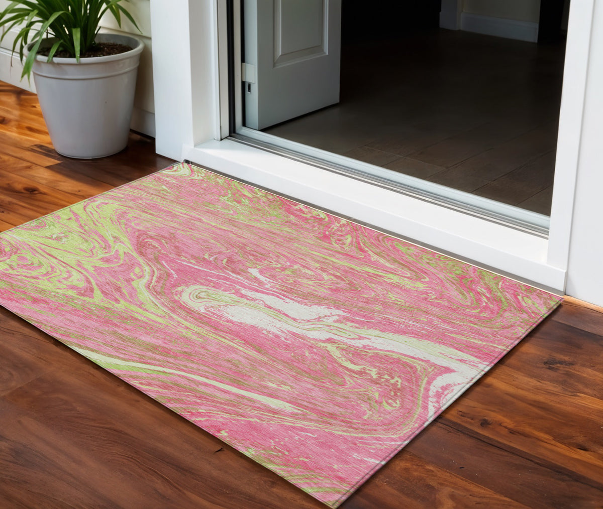 3' X 5' Pink Green And Ivory Abstract Washable Indoor Outdoor Area Rug