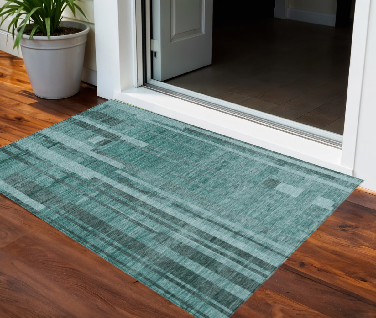 5' X 8' Teal Blue And Black Striped Washable Indoor Outdoor Area Rug