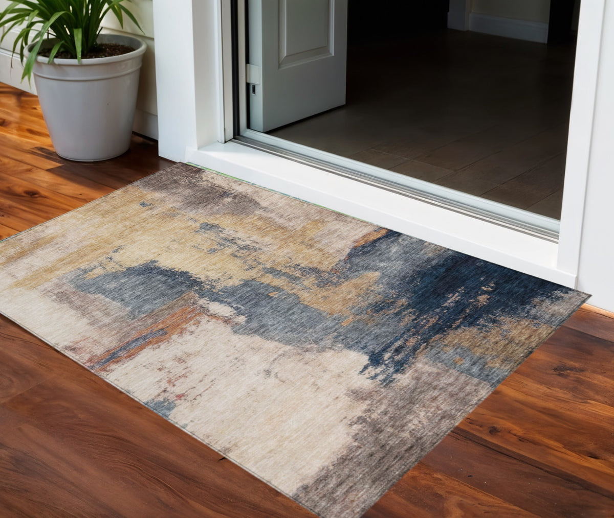 3' X 5' Gold Beige And Blue Abstract Washable Indoor Outdoor Area Rug