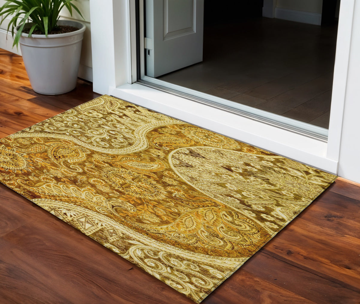 3' X 5' Terra Cotta Brown And Gold Floral Medallion Washable Indoor Outdoor Area Rug