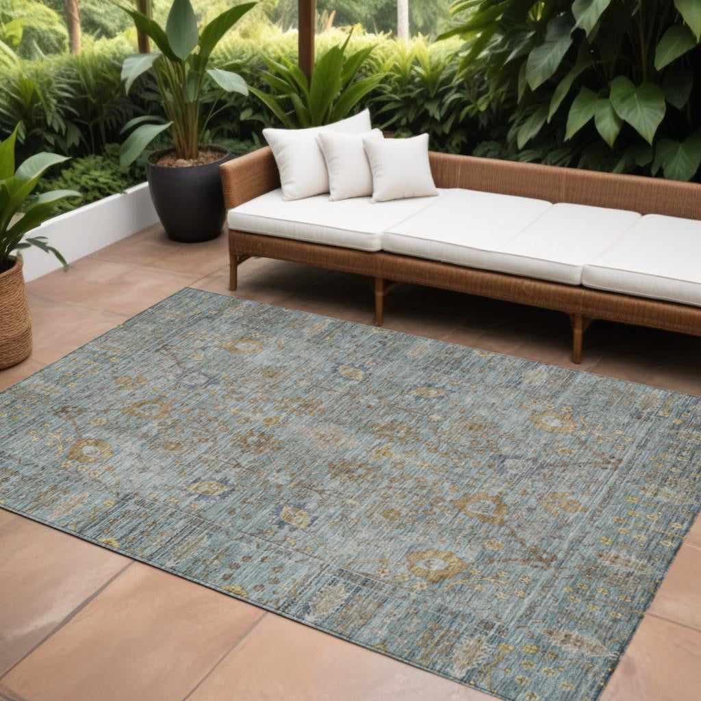 9' X 12' Teal Blue Gold And Beige Oriental Washable Indoor Outdoor Area Rug