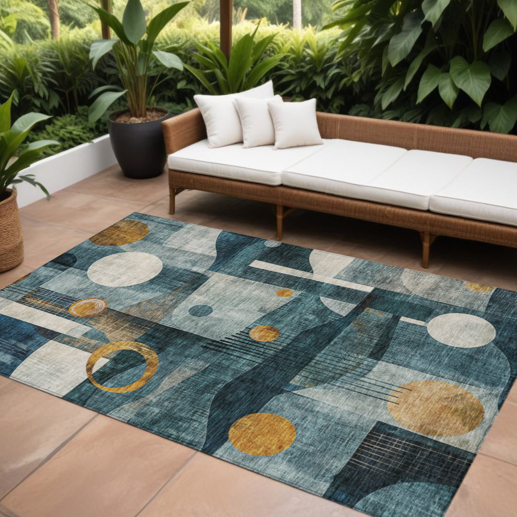 9' X 12' Teal Blue Ivory And Gold Geometric Washable Indoor Outdoor Area Rug