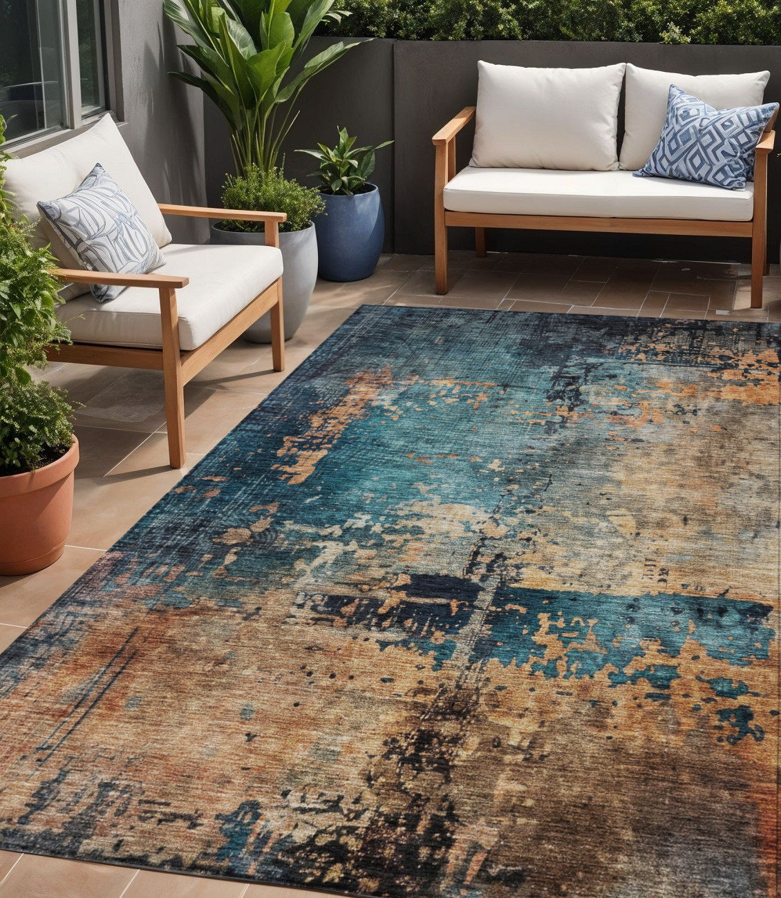 5' X 8' Teal Blue Black And Copper Abstract Washable Indoor Outdoor Area Rug