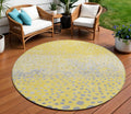 8 Yellow And Gold Round Abstract Washable Indoor Outdoor Area Rug