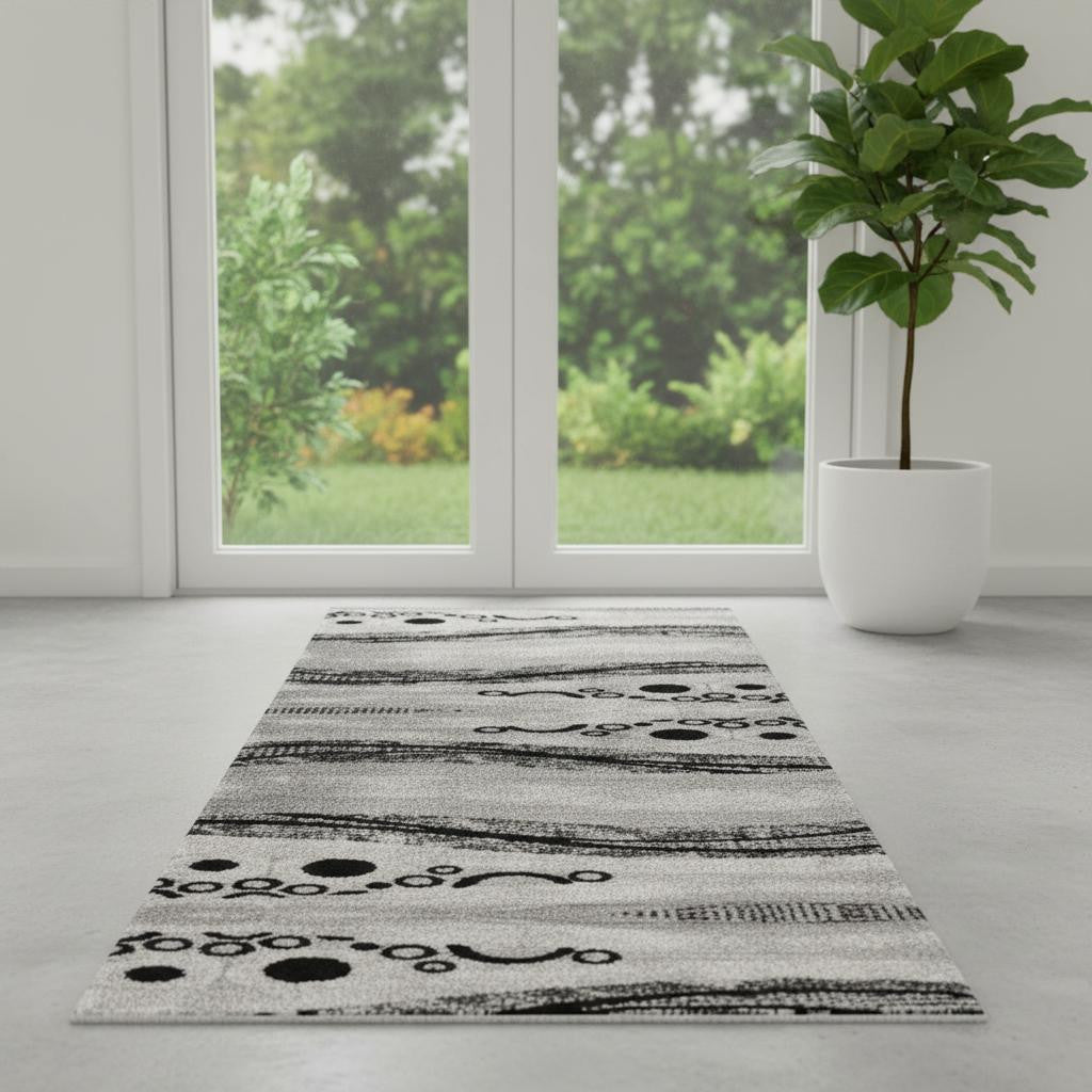 7 Gray And Black Geometric Runner Rug