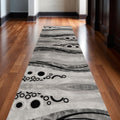 2 X 30 Gray And Black Geometric Area Rug