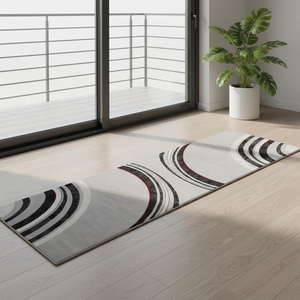 7 Gray And Black Abstract Runner Rug