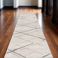 11 Beige And Gray Abstract Runner Rug
