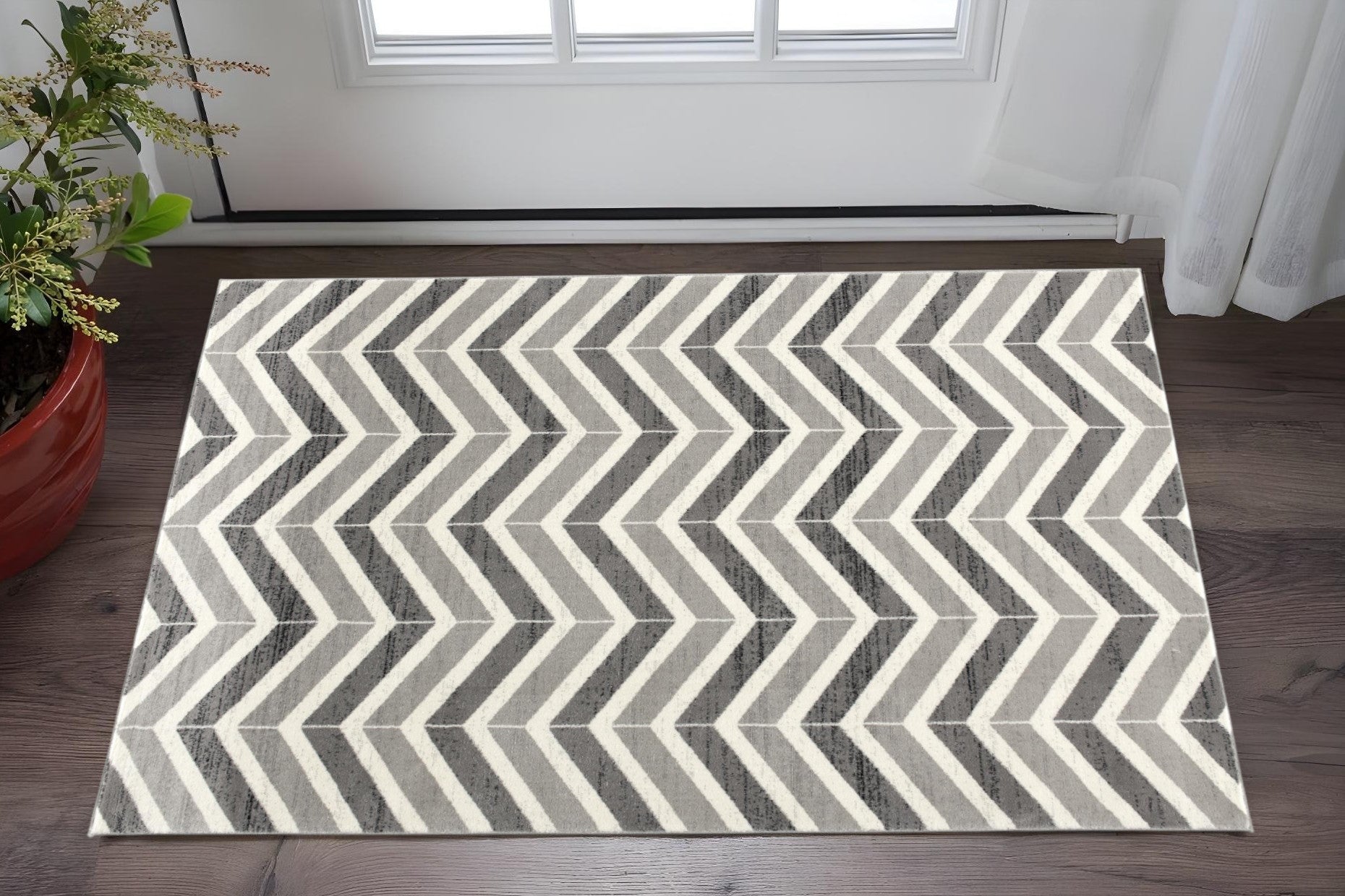 2 X 3 Gray And Beige Geometric Area Rug