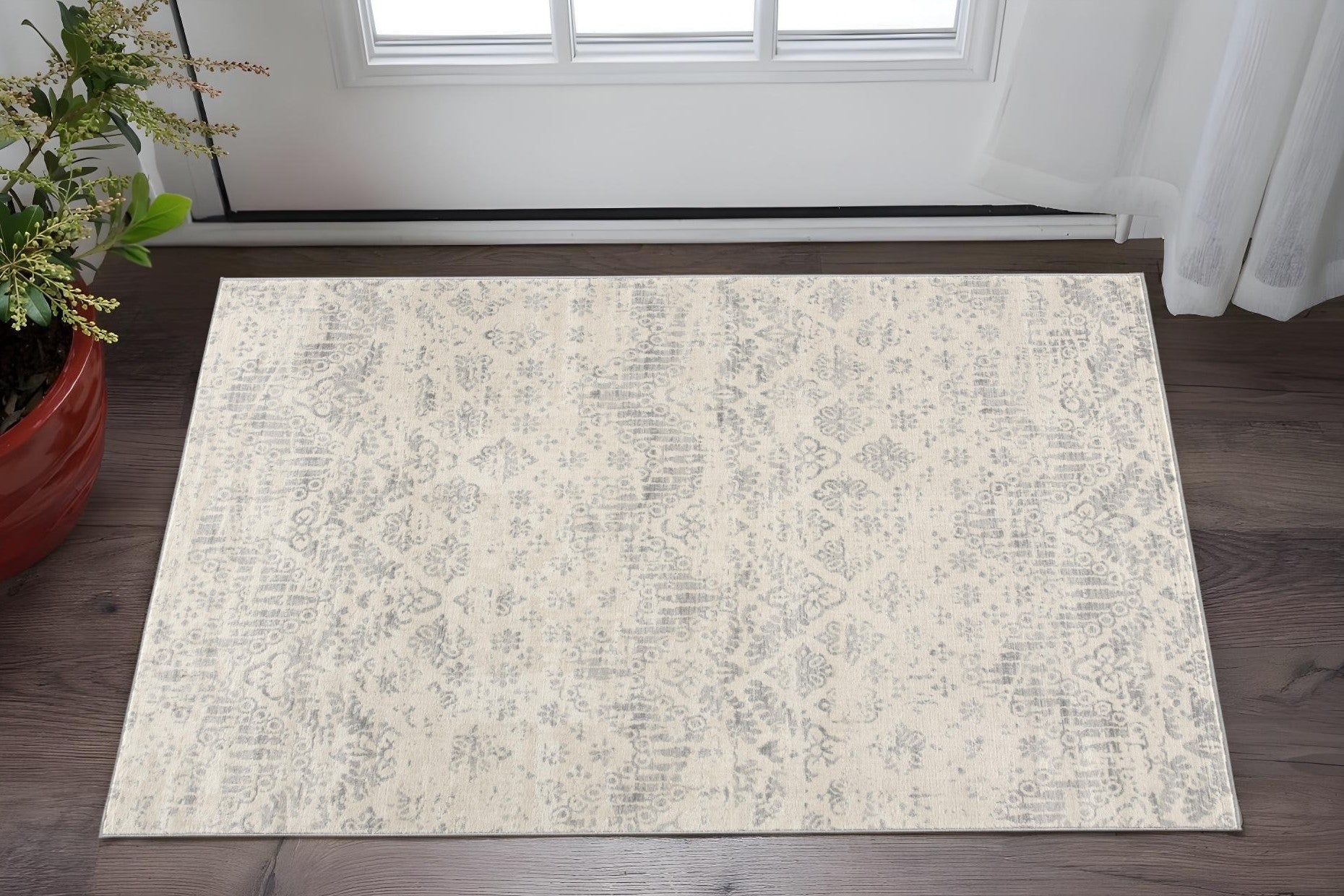 2 X 3 Beige And Gray Floral Medallion Area Rug