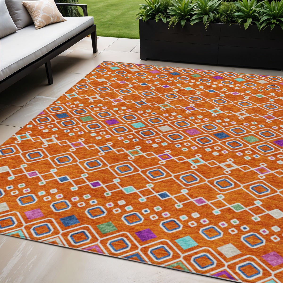 5' X 8' Orange Blue And Purple Geometric Washable Indoor Outdoor Area Rug