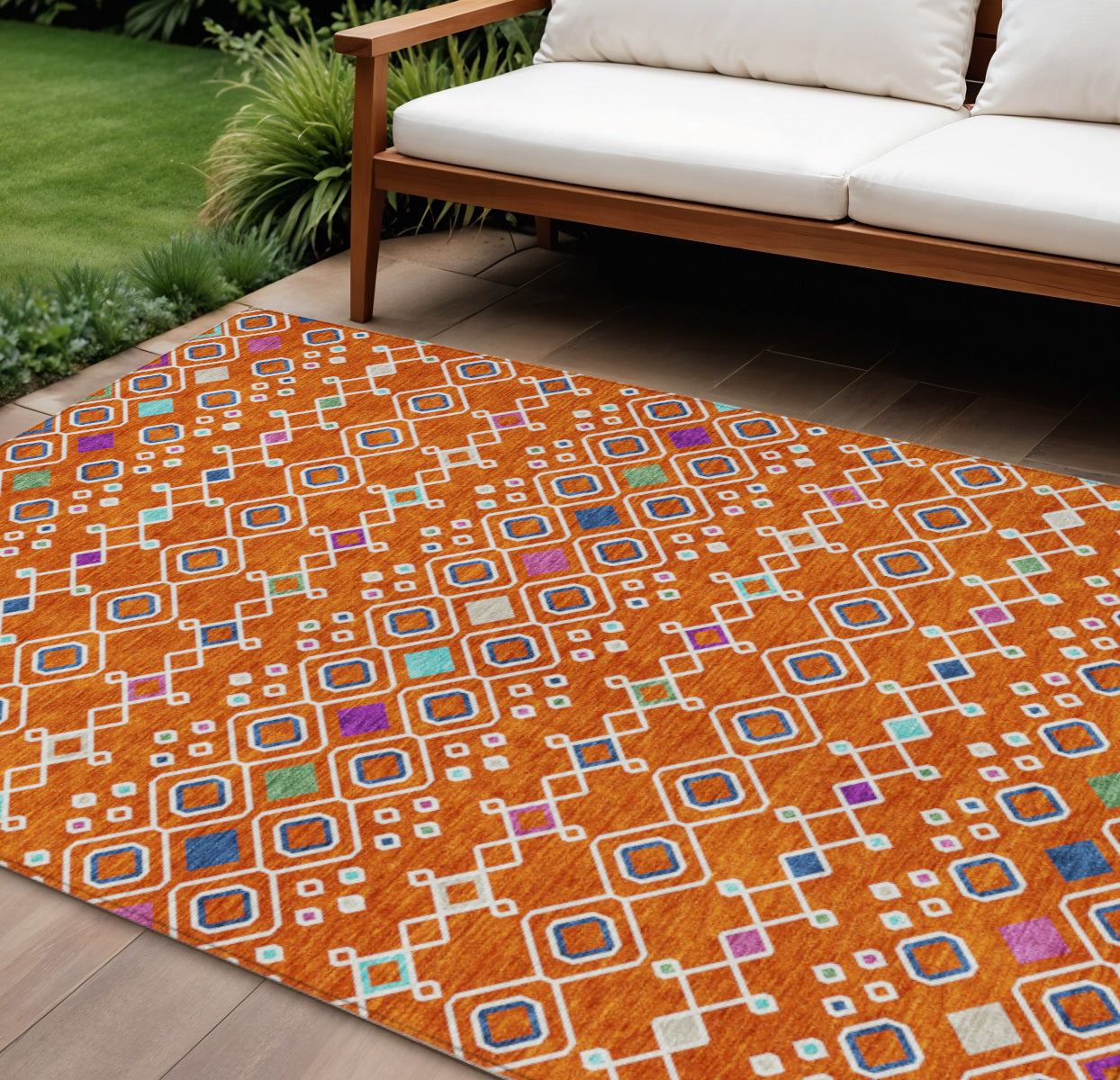 10' X 14' Orange Blue And Purple Geometric Washable Indoor Outdoor Area Rug