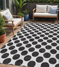 5 X 8 Black And Ivory Polka Dot Washable Indoor Outdoor Area Rug