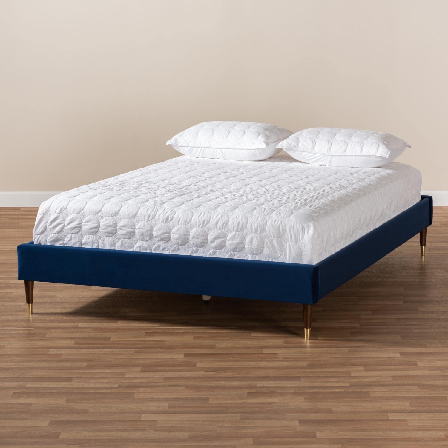 Baxton Studio Volden Glam and Luxe Navy Blue Velvet Fabric Upholstered Queen Size Wood Platform Bed Frame with Gold-Tone Leg Tips
