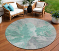 8 Teal Blue And Lavender Round Abstract Washable Indoor Outdoor Area Rug