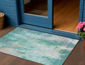 3 X 5 Teal Blue Peach And Ivory Abstract Washable Indoor Outdoor Area Rug
