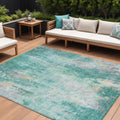5 X 8 Teal Blue Peach And Ivory Abstract Washable Indoor Outdoor Area Rug