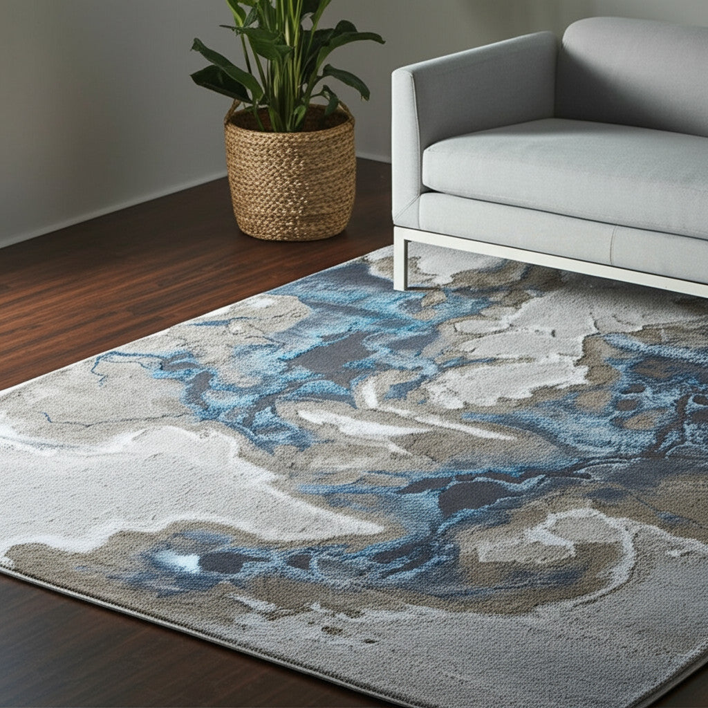 5' X 8' Taupe And Blue Abstract Area Rug
