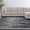 7' X 10' Gray And Black Abstract Distressed Area Rug