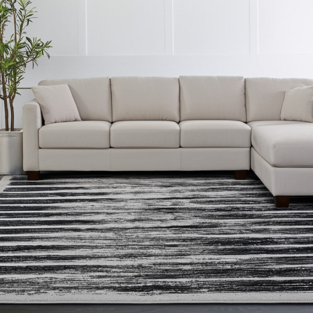 7' X 10' Gray And Black Abstract Distressed Area Rug