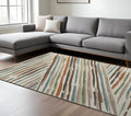 10' X 13' Ivory Brown And Blue Abstract Area Rug