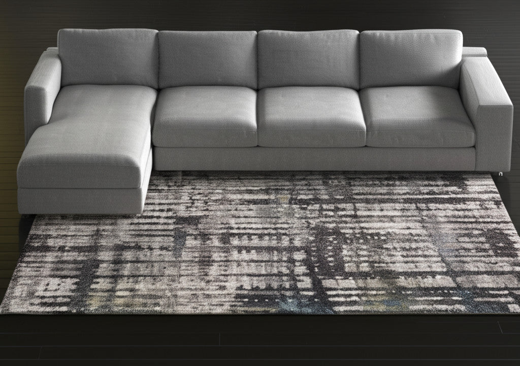 10' X 13' Gray Black And Ivory Abstract Distressed Area Rug