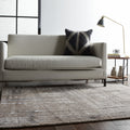 5' X 8' Brown Tan And Ivory Abstract Distressed Area Rug