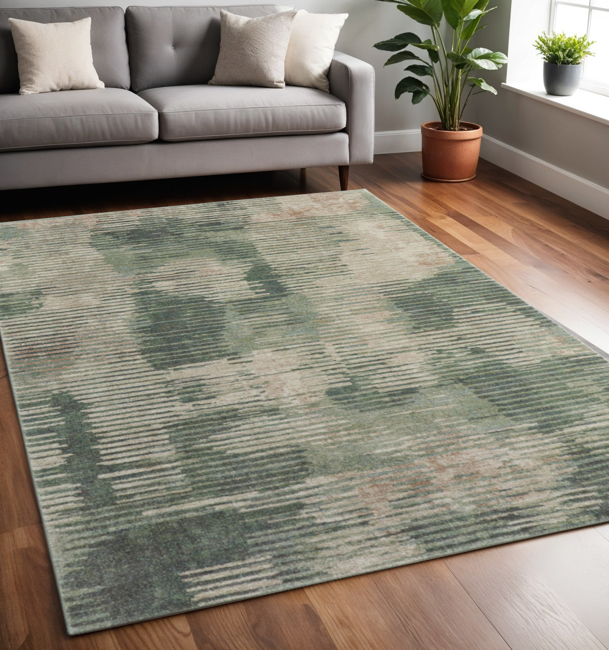 5' X 8' Green Ivory And Brown Abstract Distressed Area Rug