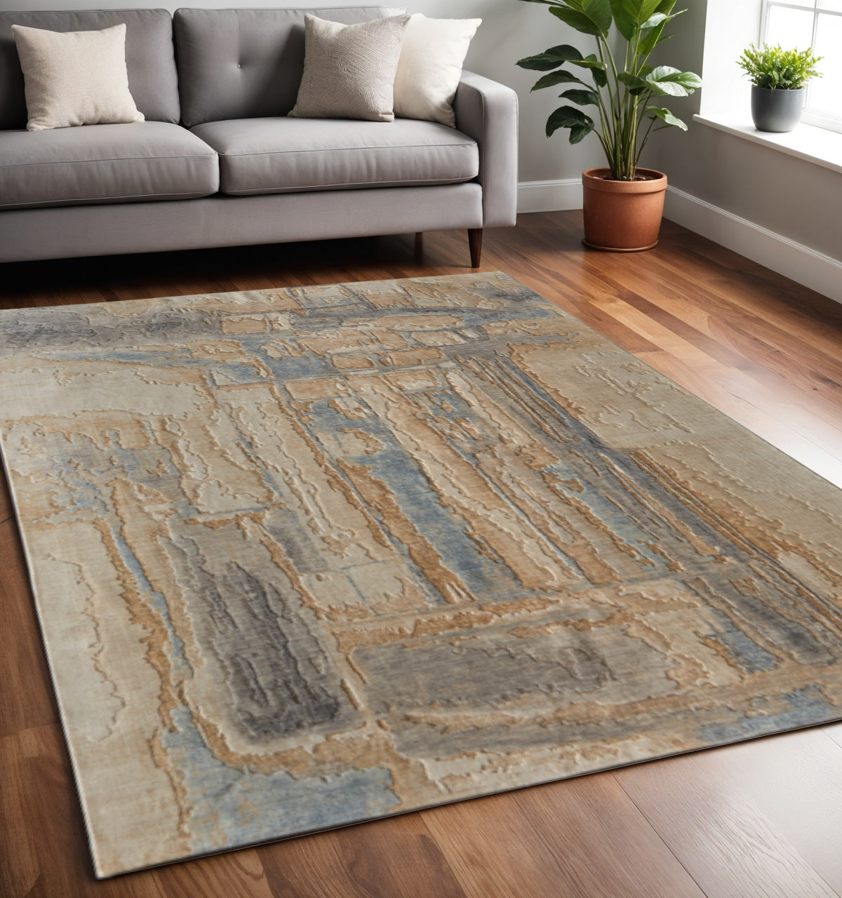 5' X 8' Tan Brown And Gray Abstract Distressed Area Rug