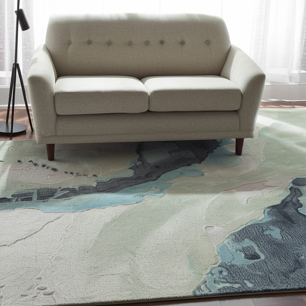 5' X 8' Green Blue And Ivory Abstract Hand Tufted Area Rug