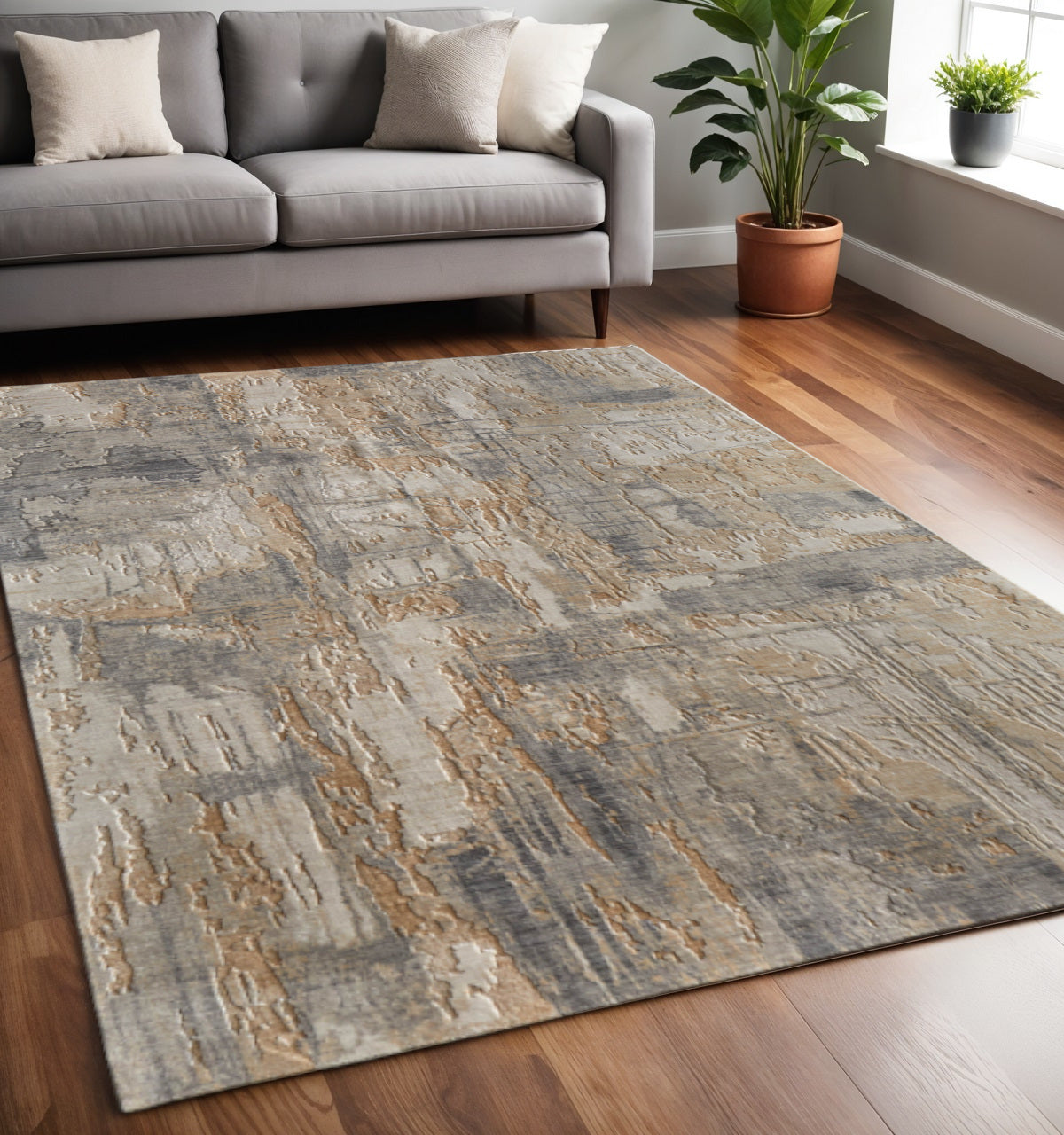 5' X 8' Gray Tan And Ivory Abstract Distressed Area Rug
