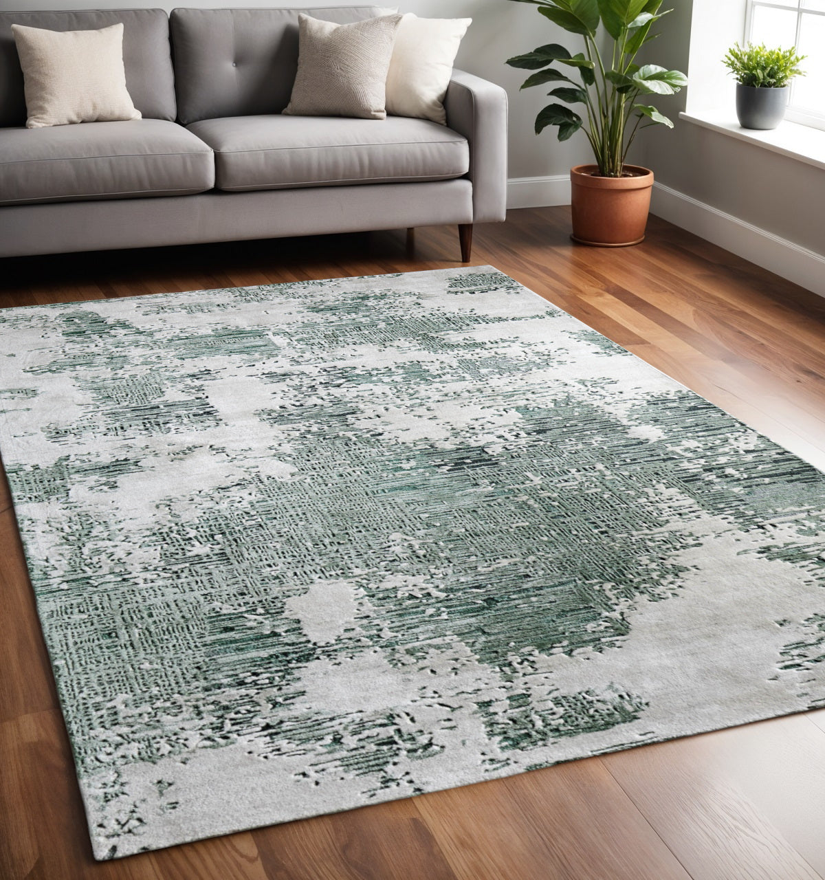 5' X 8' Green And White Abstract Hand Tufted Area Rug
