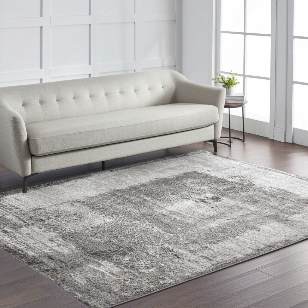 5' X 8' Gray Black And Taupe Abstract Distressed Area Rug