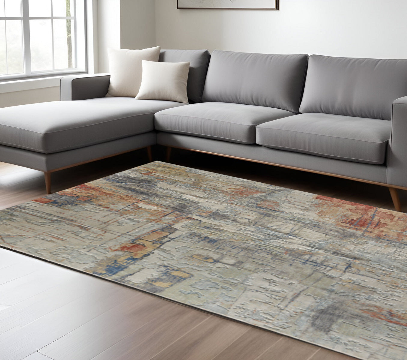9' X 12' Gray Orange And Ivory Abstract Distressed Area Rug