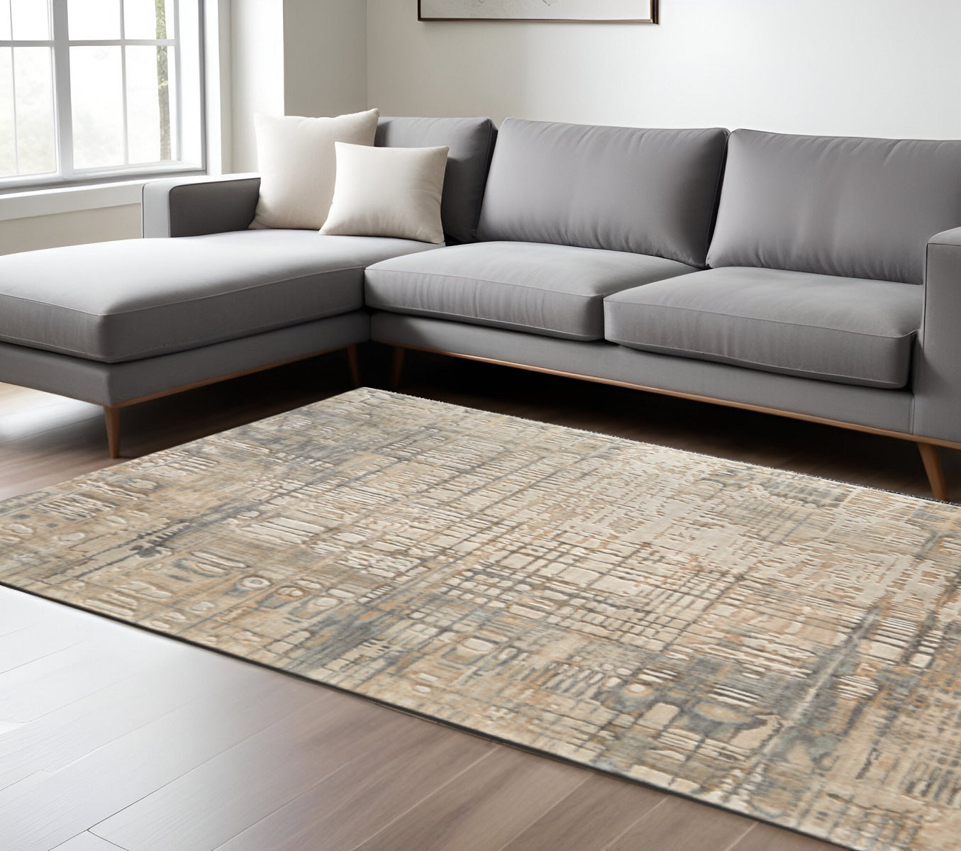 9' X 12' Ivory Tan And Gray Abstract Distressed Area Rug
