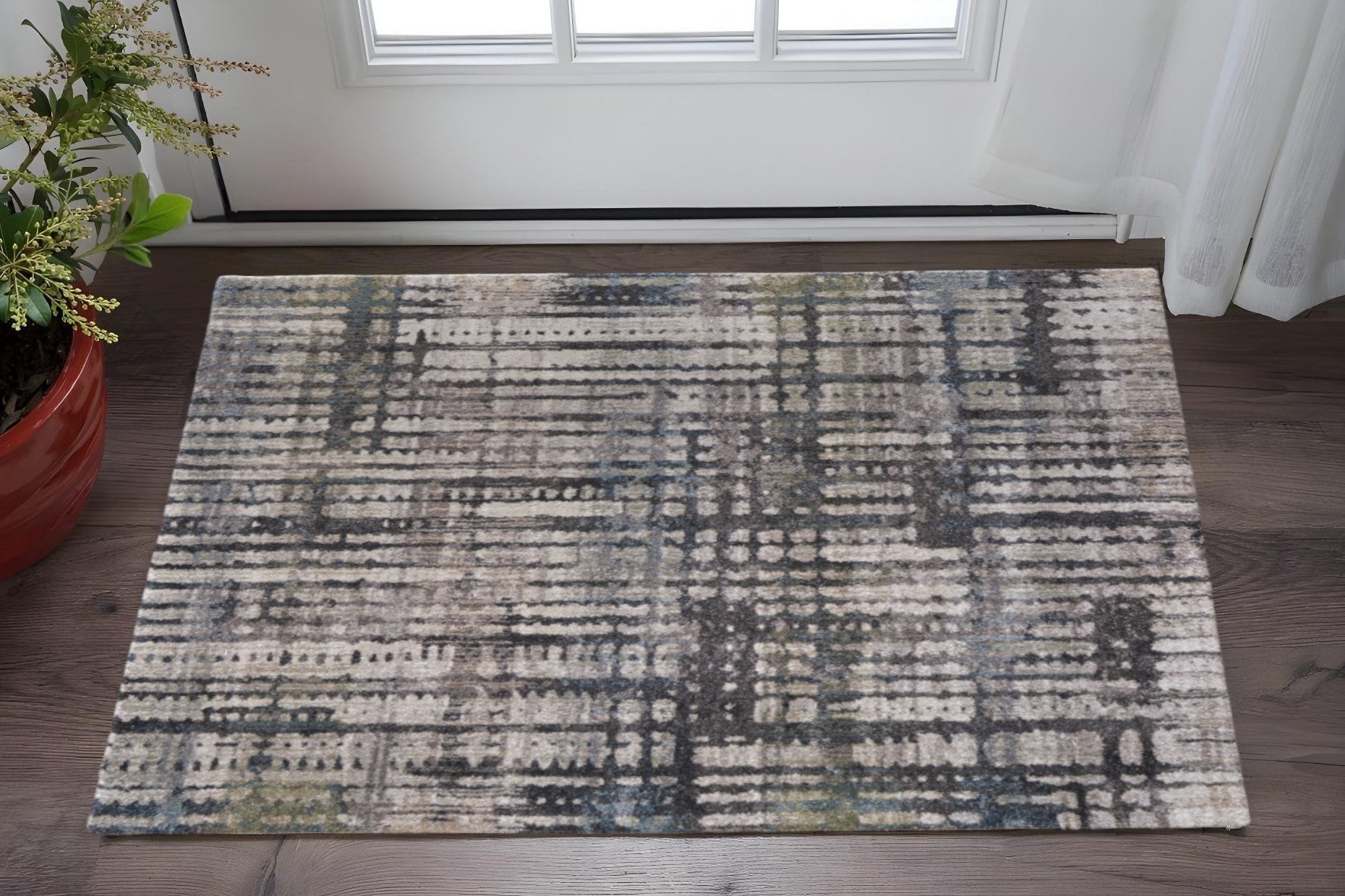 2' X 3' Gray Black And Ivory Abstract Distressed Area Rug